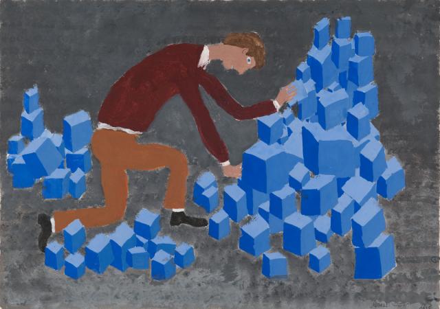 Mit Bauklötzen spielender Junge